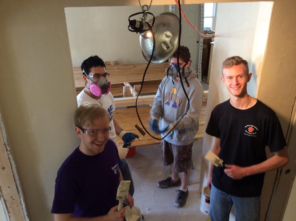 Students Volunteering in a Building